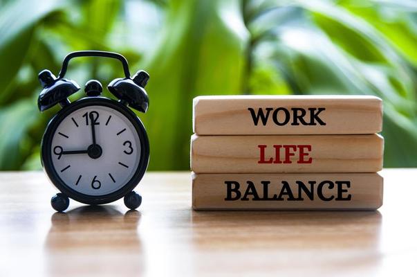 Alarm Clock Pointing At 9am With Work Life Balance Text On Wooden Blocks Work Life Balance Concept Photo